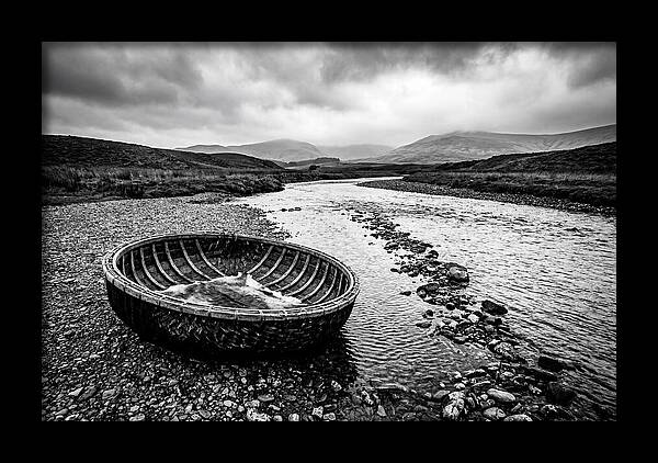 Traditional Coracle On Welsh River
