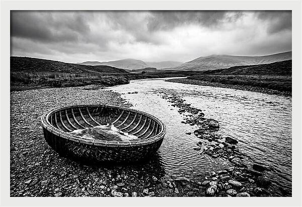 Traditional Coracle On Welsh River