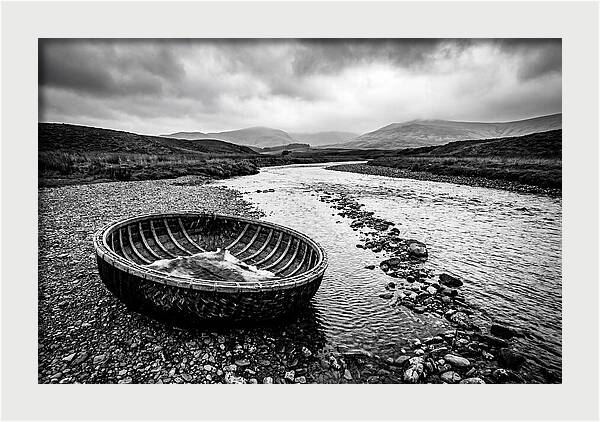 Traditional Coracle On Welsh River