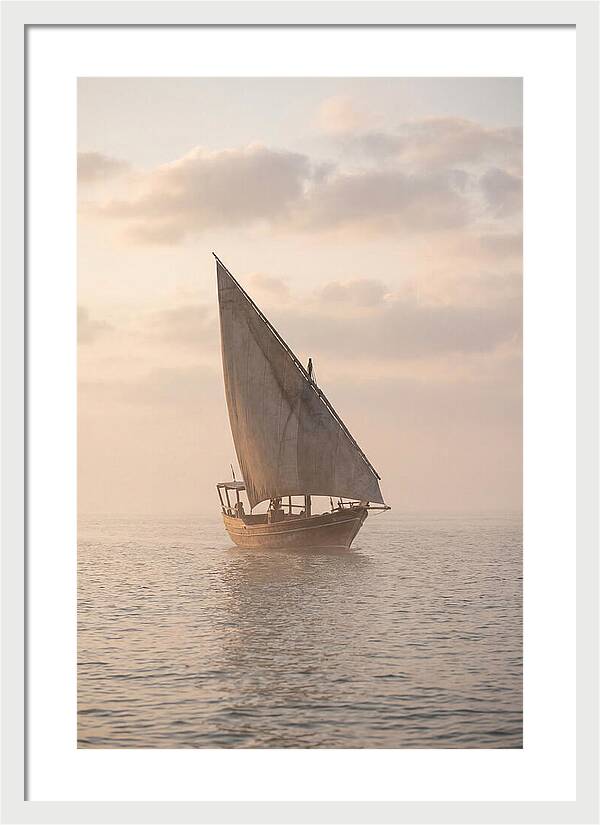 Traditional Dhow Sailing Into The Horizon