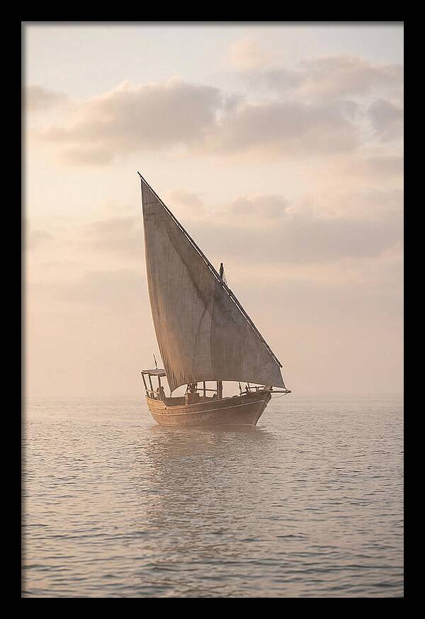 Traditional Dhow Sailing Into The Horizon