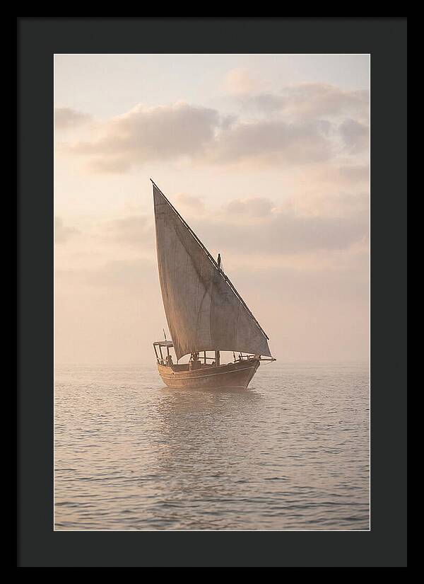 Traditional Dhow Sailing Into The Horizon