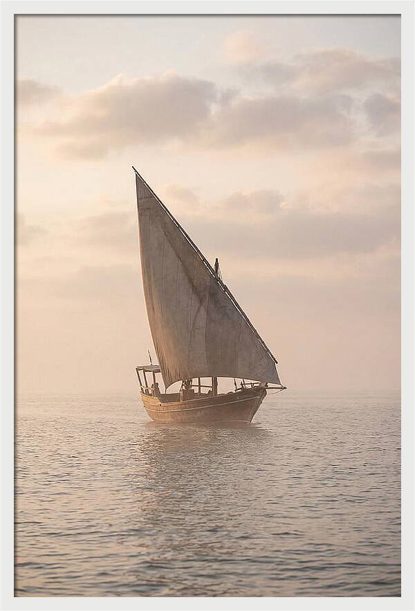 Traditional Dhow Sailing Into The Horizon