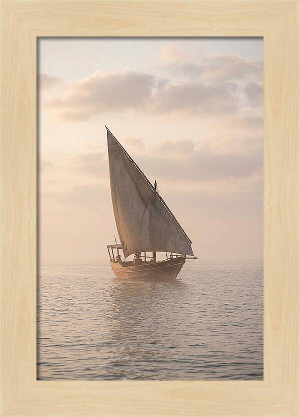 Traditional Dhow Sailing Into The Horizon