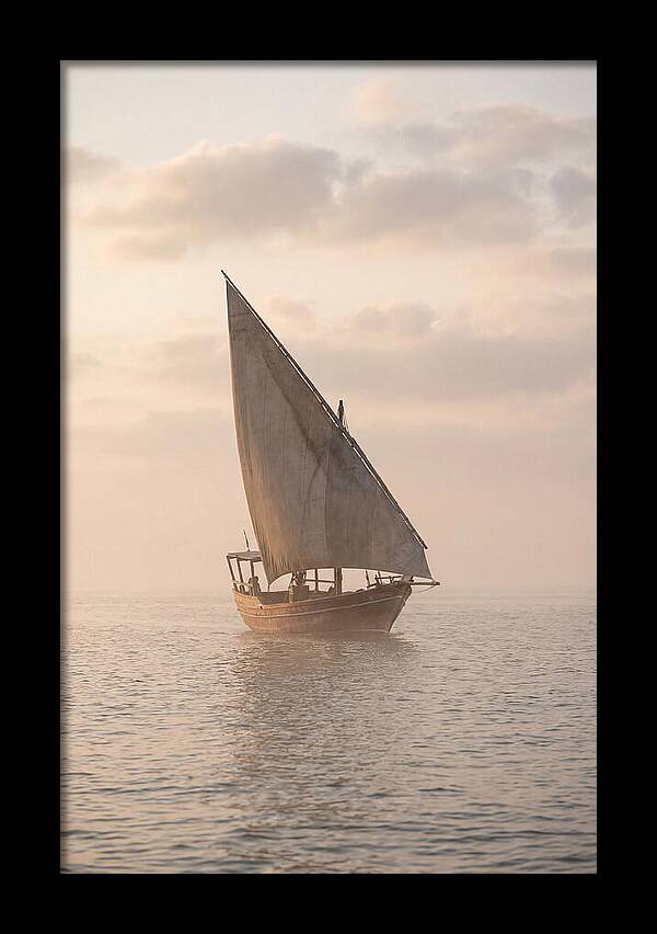 Traditional Dhow Sailing Into The Horizon
