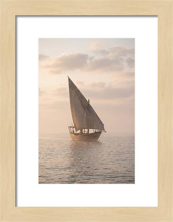 Traditional Dhow Sailing Into The Horizon