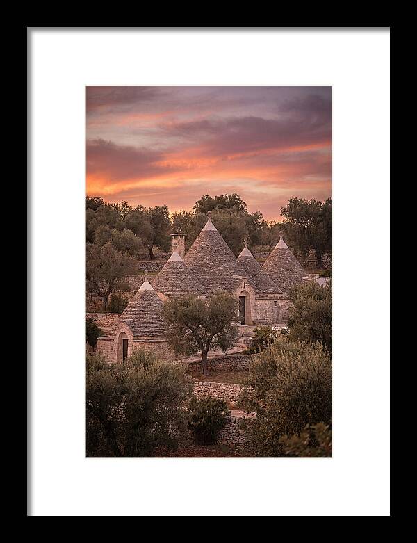 Trulli Houses Under Sunset Skies