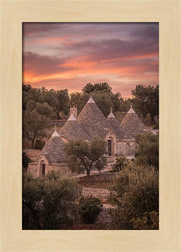 Trulli Houses Under Sunset Skies