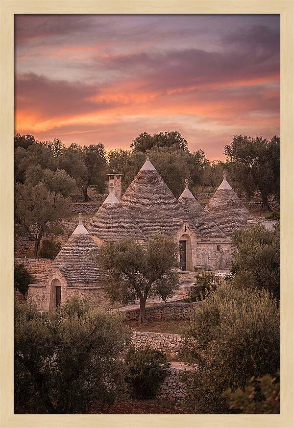 Trulli Houses Under Sunset Skies