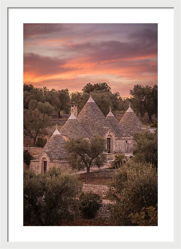 Trulli Houses Under Sunset Skies
