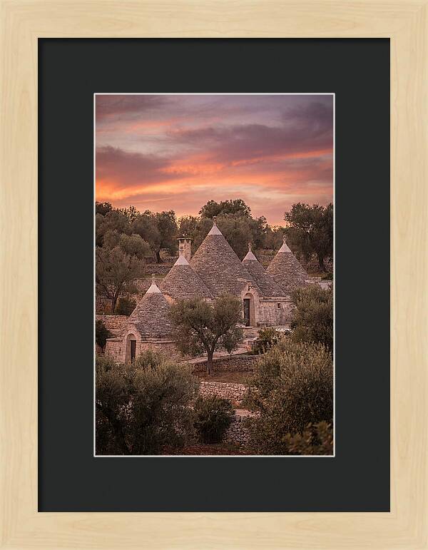 Trulli Houses Under Sunset Skies