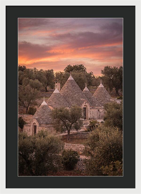 Trulli Houses Under Sunset Skies
