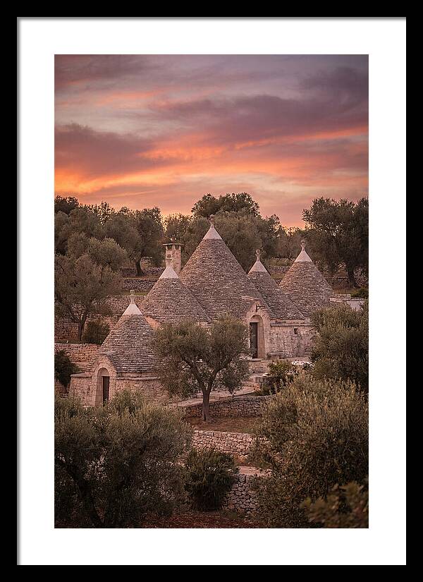 Trulli Houses Under Sunset Skies