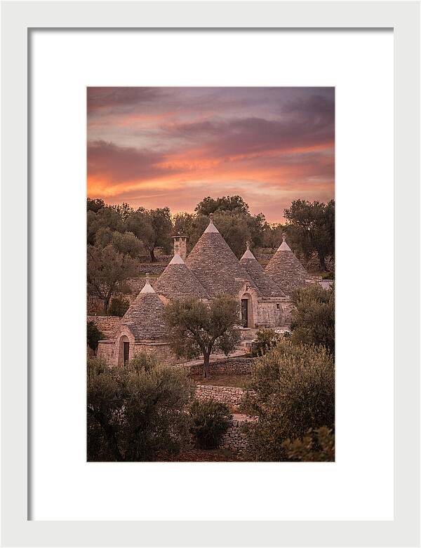 Trulli Houses Under Sunset Skies