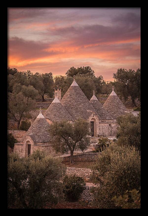 Trulli Houses Under Sunset Skies