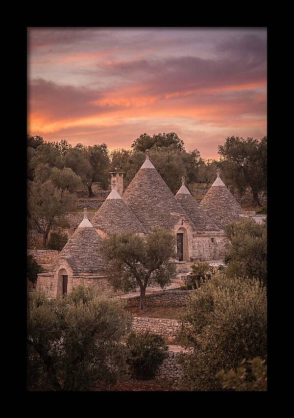 Trulli Houses Under Sunset Skies