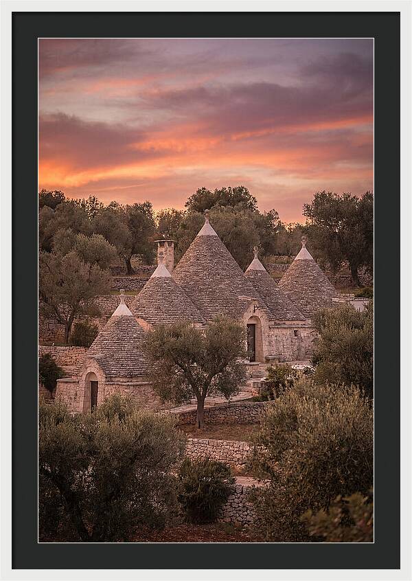 Trulli Houses Under Sunset Skies
