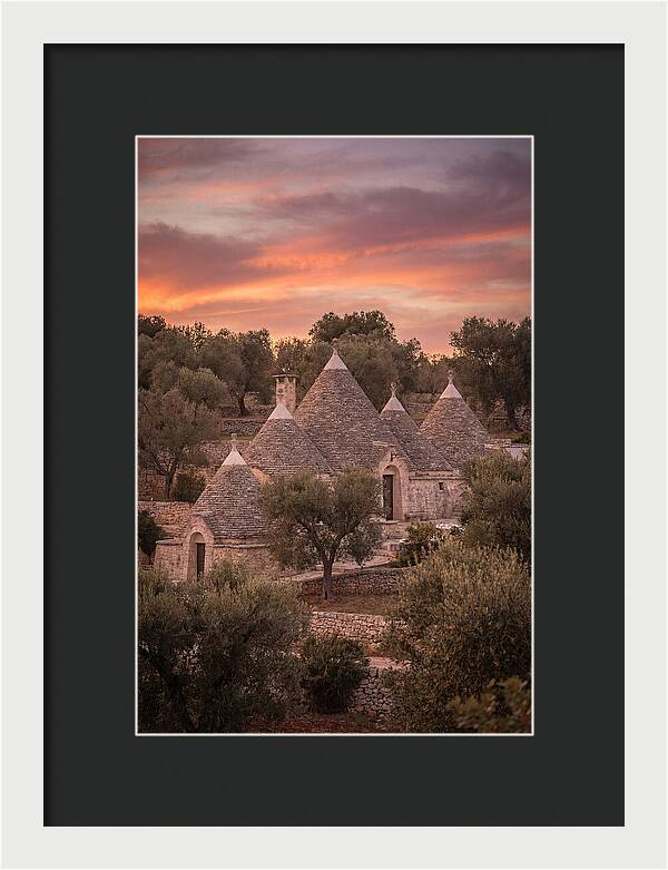 Trulli Houses Under Sunset Skies