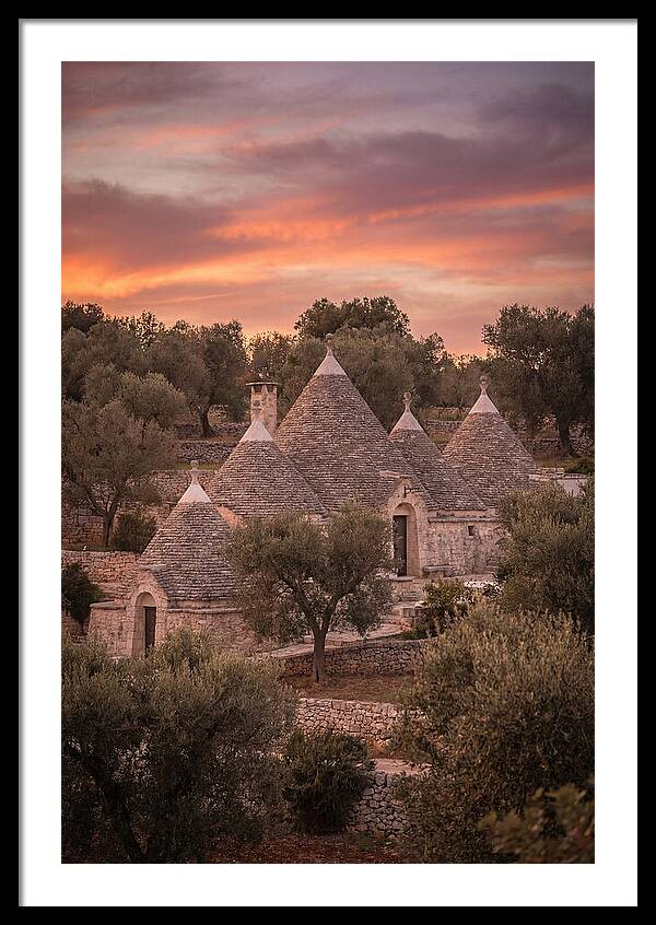 Trulli Houses Under Sunset Skies