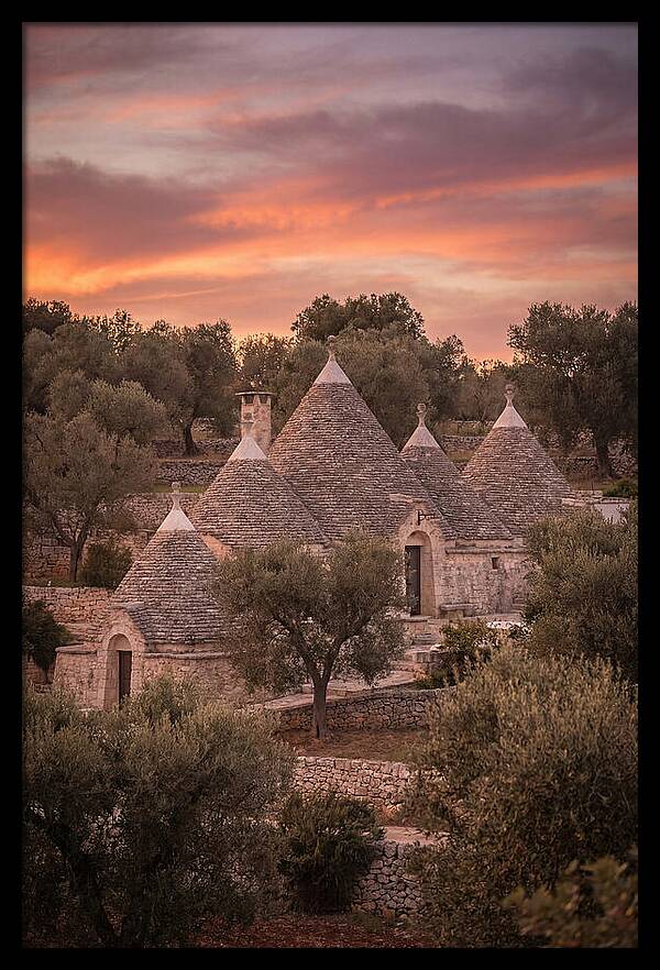 Trulli Houses Under Sunset Skies