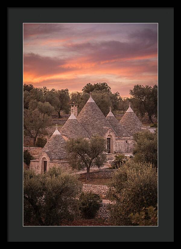 Trulli Houses Under Sunset Skies