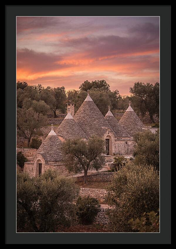 Trulli Houses Under Sunset Skies