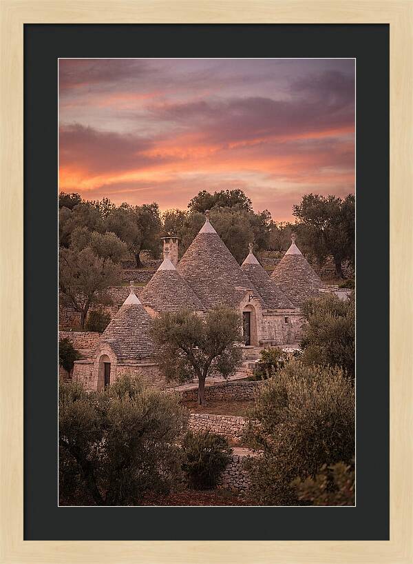 Trulli Houses Under Sunset Skies