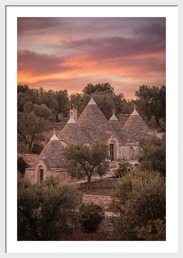 Trulli Houses Under Sunset Skies