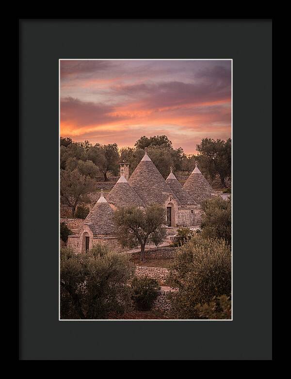 Trulli Houses Under Sunset Skies