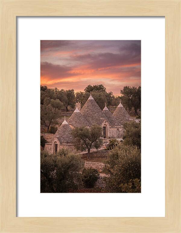 Trulli Houses Under Sunset Skies