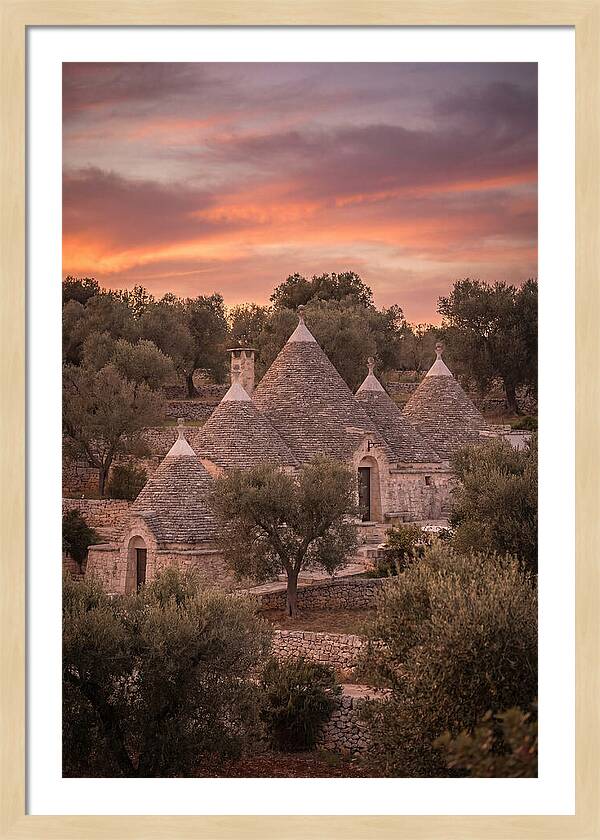 Trulli Houses Under Sunset Skies