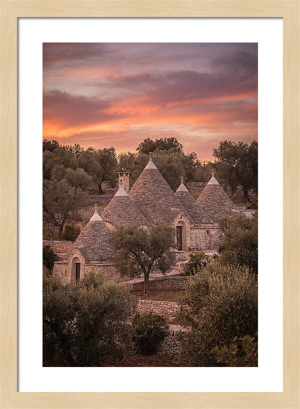 Trulli Houses Under Sunset Skies