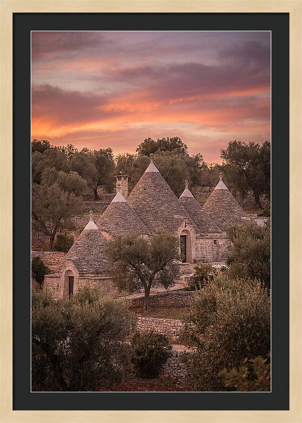 Trulli Houses Under Sunset Skies