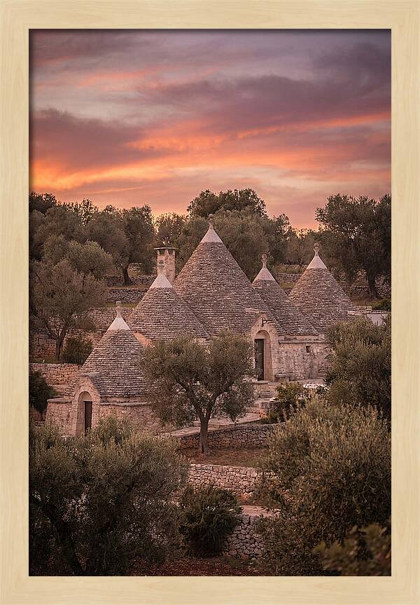 Trulli Houses Under Sunset Skies