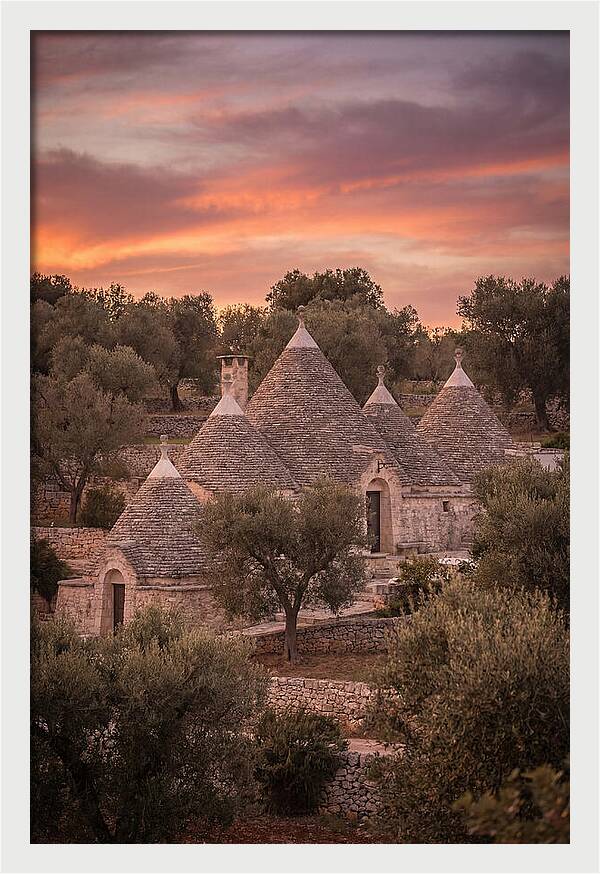 Trulli Houses Under Sunset Skies
