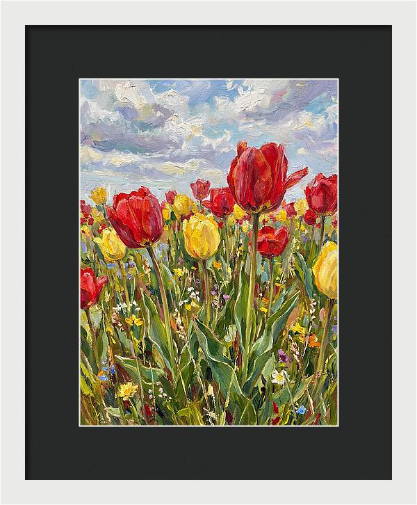 Vibrant Tulip Field Under Clouds