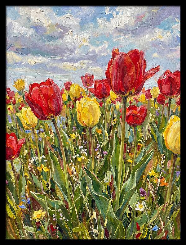 Vibrant Tulip Field Under Clouds