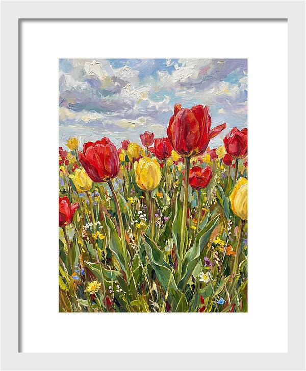 Vibrant Tulip Field Under Clouds