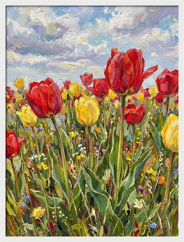 Vibrant Tulip Field Under Clouds