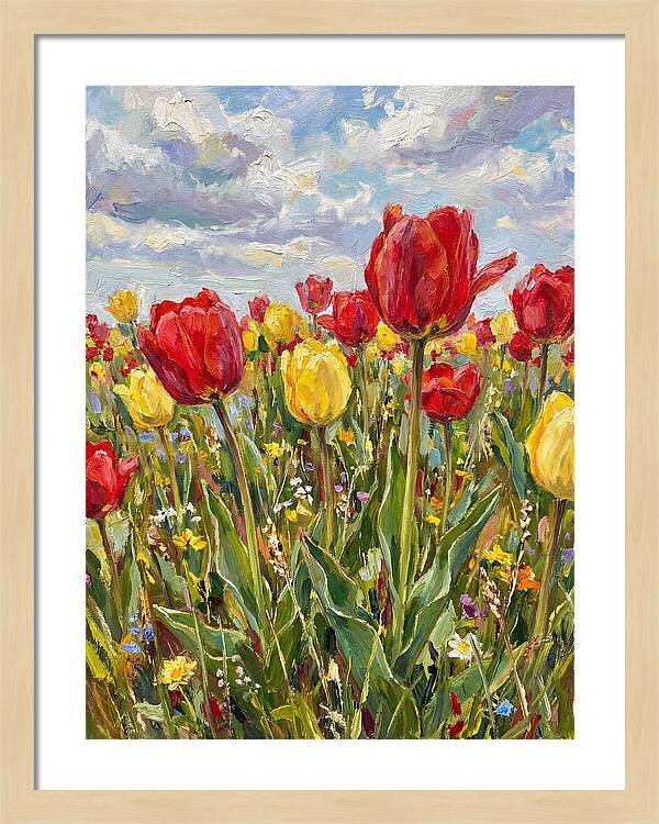 Vibrant Tulip Field Under Clouds
