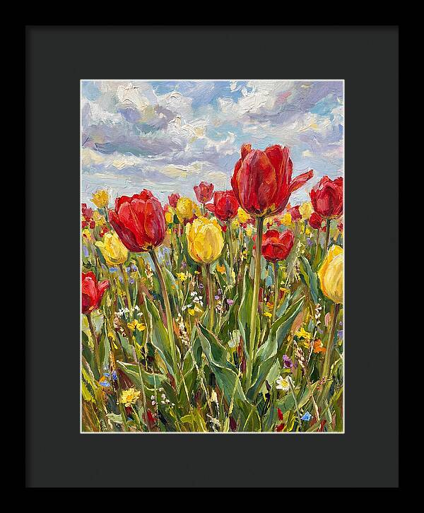 Vibrant Tulip Field Under Clouds