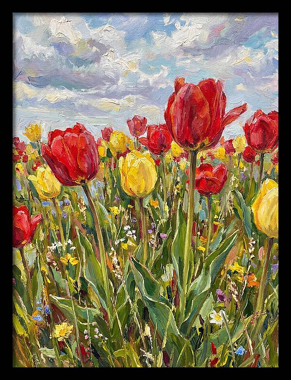 Vibrant Tulip Field Under Clouds