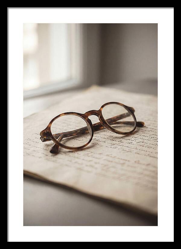 Vintage Eyeglasses On Antique Document