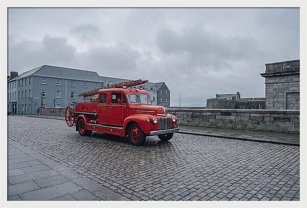 Vintage Fire Engine On Cobblestone Street