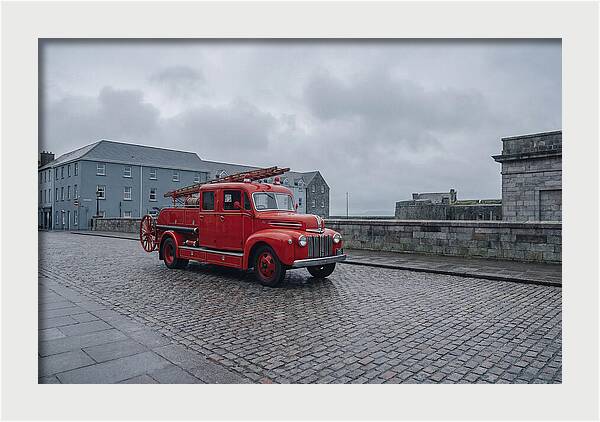 Vintage Fire Engine On Cobblestone Street