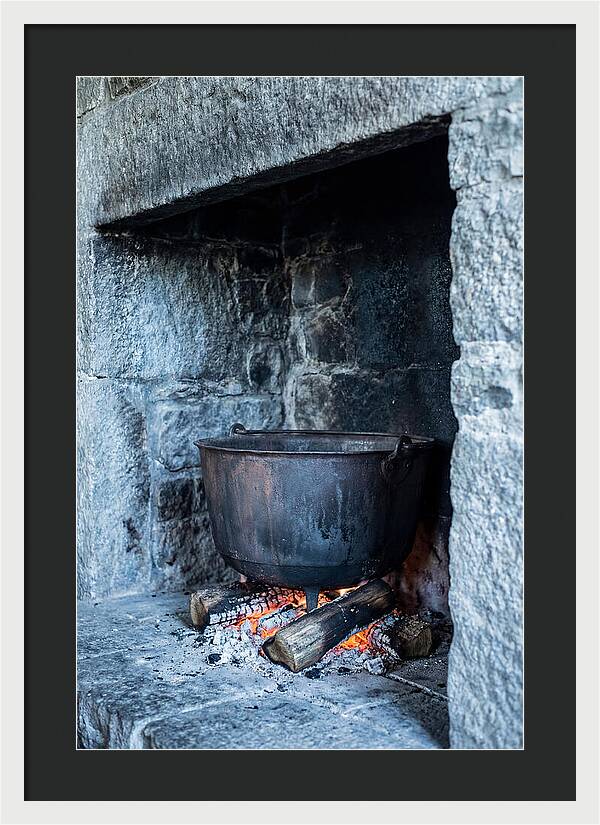 Vintage Iron Cauldron In Fireplace