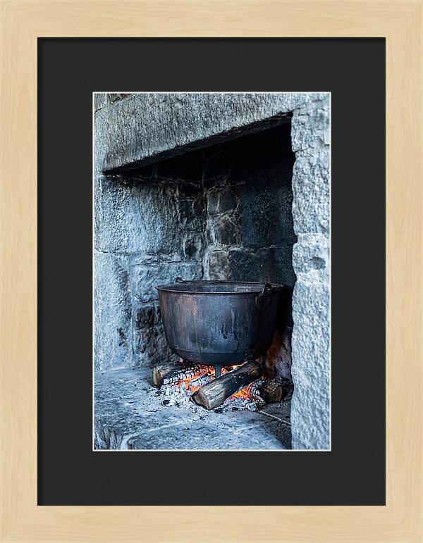 Vintage Iron Cauldron In Fireplace