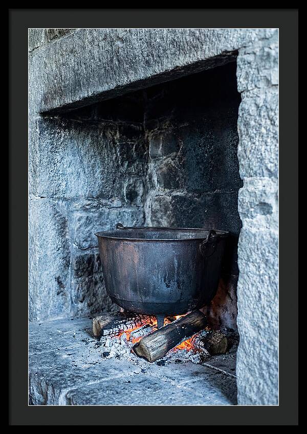 Vintage Iron Cauldron In Fireplace