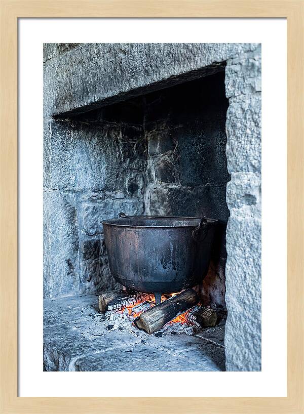 Vintage Iron Cauldron In Fireplace