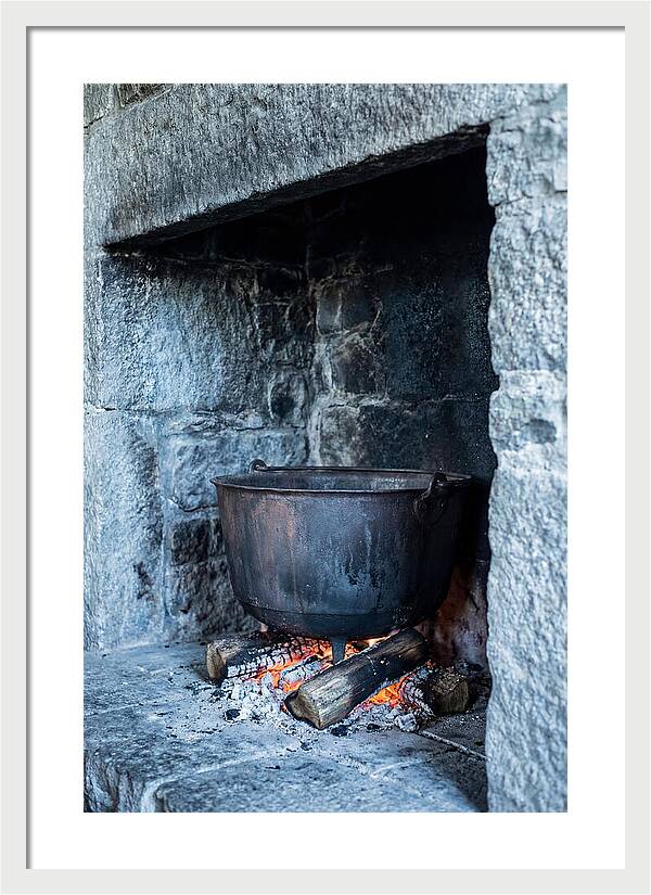Vintage Iron Cauldron In Fireplace